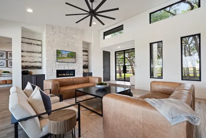 Open living room filled with natural light and cozy seating.