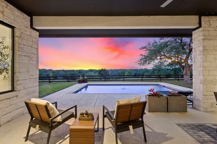 Cozy patio with comfortable seating and a peaceful atmosphere, perfect for morning coffee or evening relaxation.