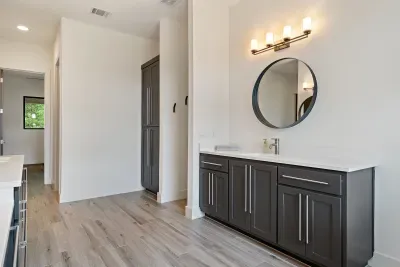 Unwind in our spacious bathroom with modern amenities and a touch of luxury