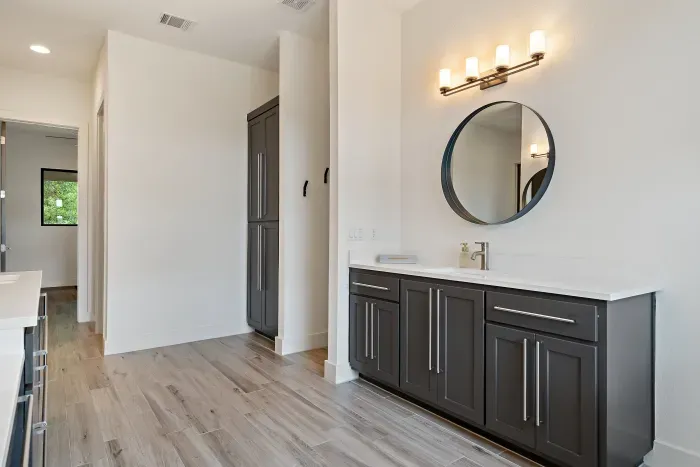 Unwind in our spacious bathroom with modern amenities and a touch of luxury