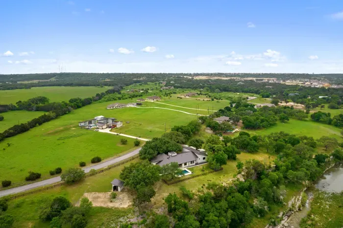 Contemporary luxury blended with nature’s beauty at sunset.