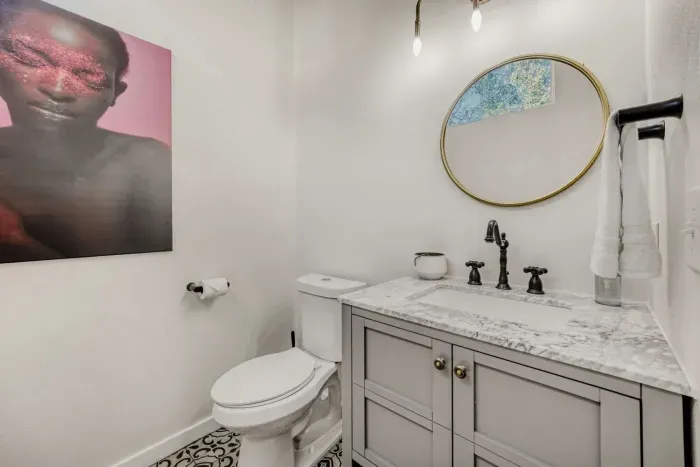 Modern vanity and finishes for added convenience.