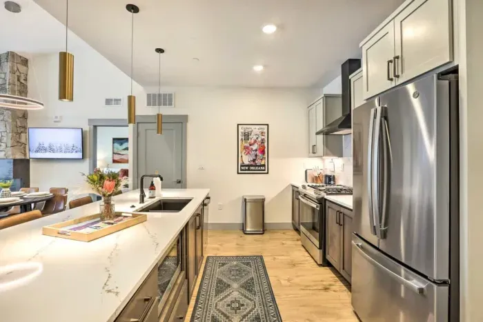 Enjoy family meals or casual snacks in this well-appointed kitchen with plenty of natural light.
