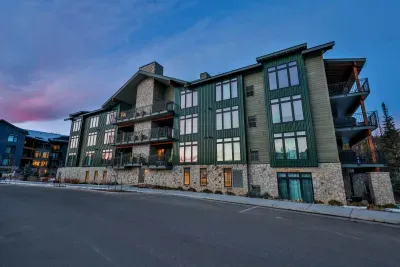 Modern mountain lodge style condo exterior.