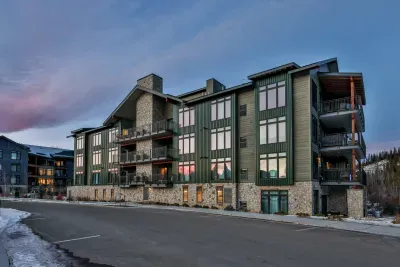 Evening exterior view of the building at dusk.