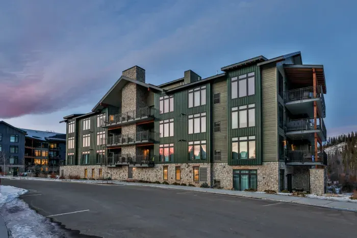 Evening exterior view of the building at dusk.
