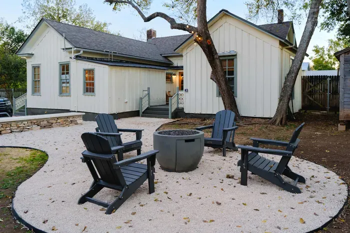 Outdoor fire pit seating area for relaxing evenings.