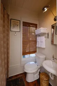 Full bathroom with shower and classic finishes