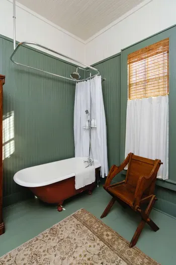 Clawfoot tub bathroom with vintage style