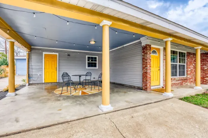 Charming home with a covered front patio and welcoming front entrance