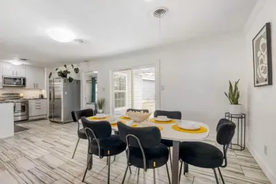 Modern dining space with seating for six, perfect for shared meals or game nights