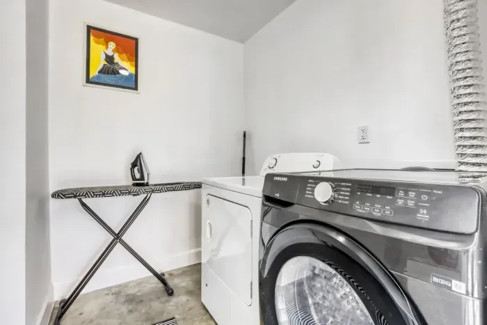 Convenient washer and dryer and iron available for use
