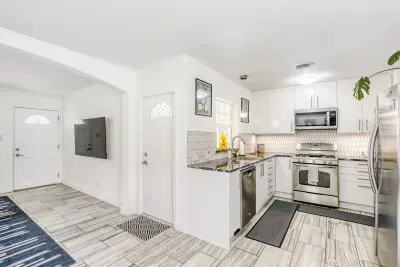Bright open kitchen, perfect design for cooking while staying connected with your group