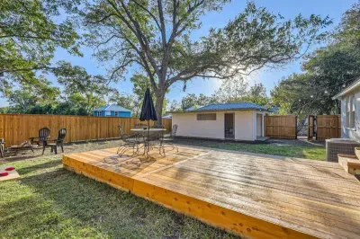 Enjoy the spacious backyard, complete with fun yard games and a cozy fire pit. Perfect for entertaining, the fire pit creates a warm, inviting atmosphere, while the games add excitement for all ages.