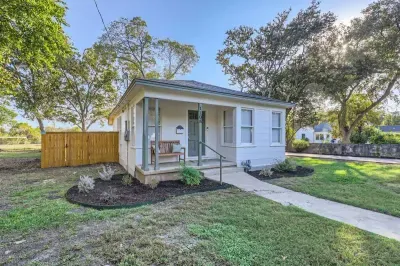 Charming curb appeal with a charming front yard and picturesque details.