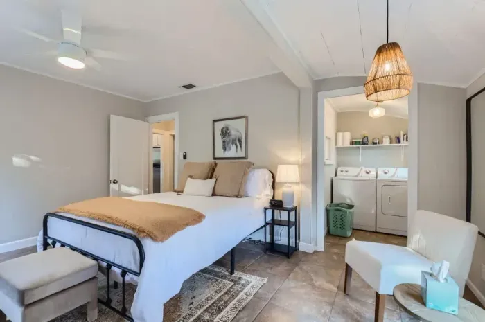 Guest-friendly bedroom with a cozy vibe and ample storage space.