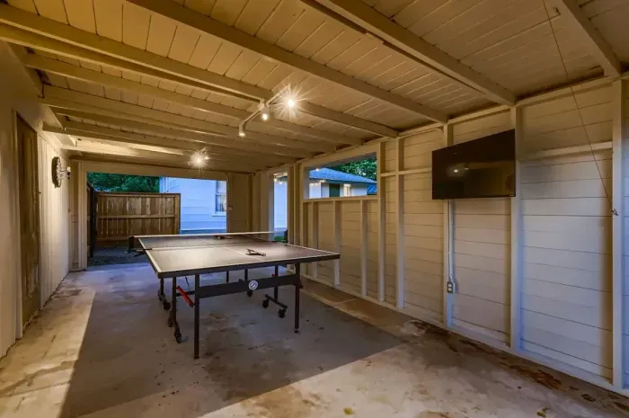 Have fun with friends and family at the ping pong table, conveniently located under the carport. Perfect for a friendly match or casual hangout, rain or shine!