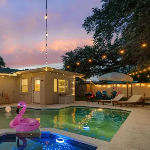 Perfect for cannonballs or cocktails, this poolside escape is yours to enjoy.