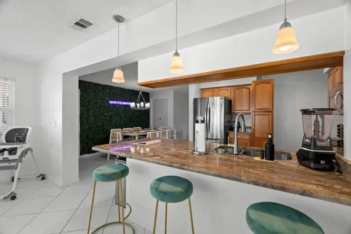 Functional and beautiful, this kitchen comes fully equipped with cookware, utensils, and small appliances.