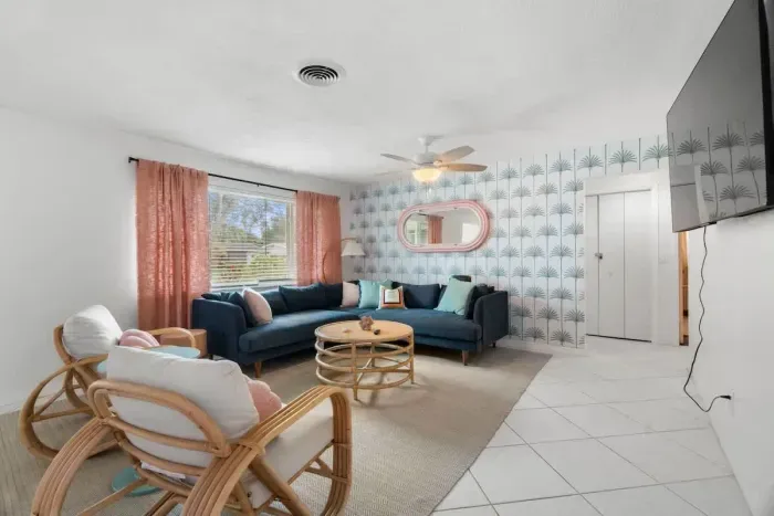 Kick back in a cozy living room with plenty of seating for everyone.