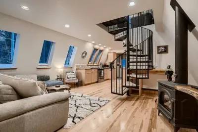 Spacious living room featuring a cozy gas fireplace, perfect for creating a warm and inviting atmosphere. This expansive area offers ample space for relaxation and entertaining, making it ideal for gatherings with family and friends.