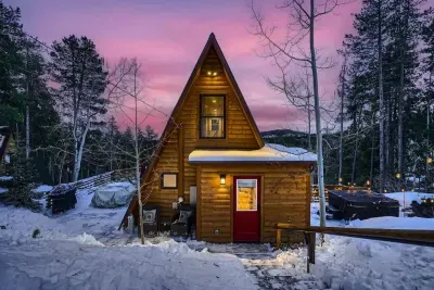 3. Whole cabin nestled in the mountain woods
