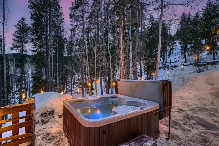 Relax in the private hot tub, nestled in a peaceful forest setting. Surrounded by nature, this tranquil retreat offers the perfect escape to unwind, soak in the serene atmosphere, and enjoy the sights and sounds of the woods.