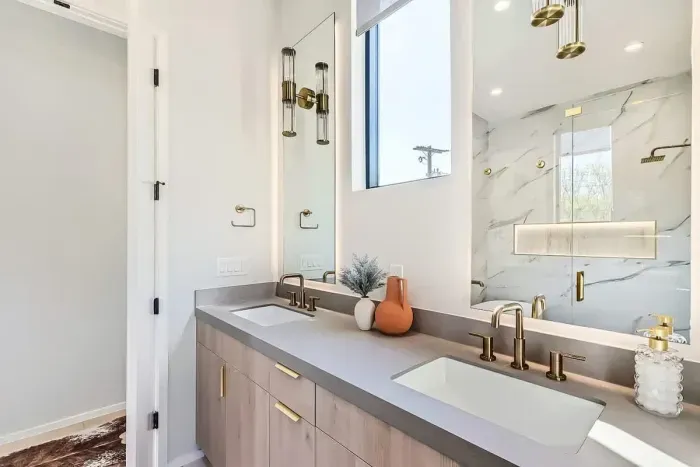 Unwind in our spacious bathroom with modern amenities and a touch of luxury.