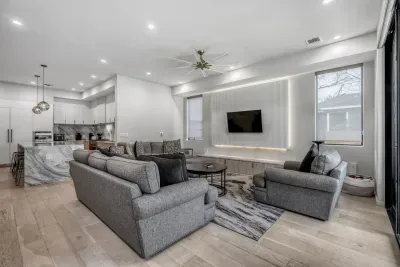 Bright and airy living space with modern furnishings and plenty of natural light.
