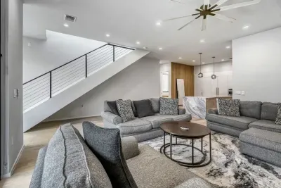 Bright and airy living space with modern furnishings and plenty of natural light.