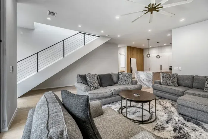 Bright and airy living space with modern furnishings and plenty of natural light.