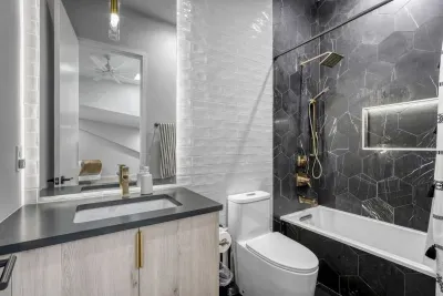 Step into a rainfall shower with endless hot water, ready to recharge you after a day of exploring.