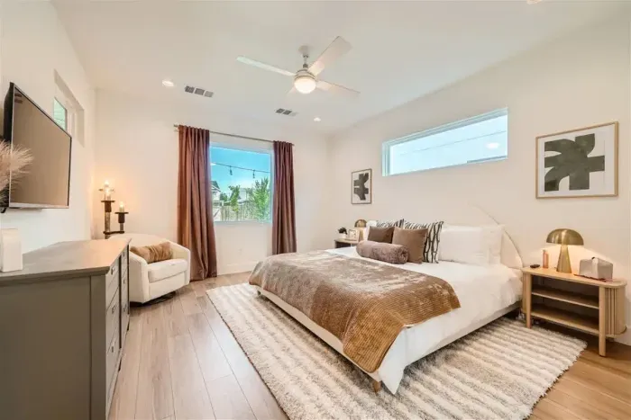 Luxurious bedroom with premium linens and a reading nook for ultimate relaxation.