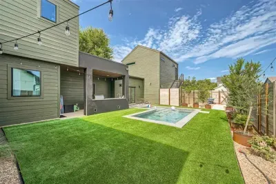 Relaxing backyard with a beautiful pool feature that adds a calming ambiance to the space.