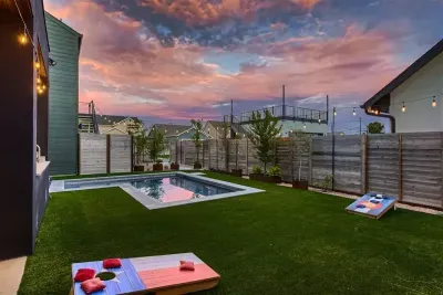 Enjoy the spacious backyard featuring a beautiful pool, perfect for swimming, lounging, and outdoor relaxation. Surrounded by lush landscaping and ample seating, it’s an ideal space for both fun and relaxation.