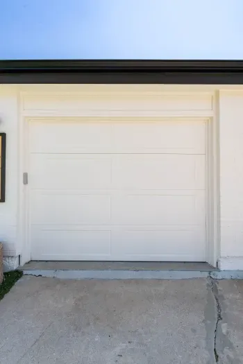 Private garage and driveway offering easy on-site parking.