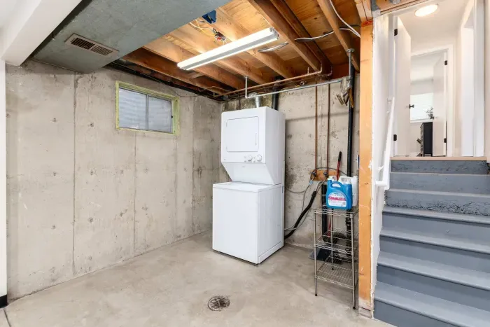 Clean, convenient laundry area with washer and dryer.