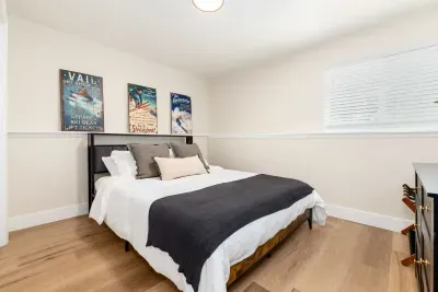Third bedroom with comfortable twin beds and relaxing neutral tones.