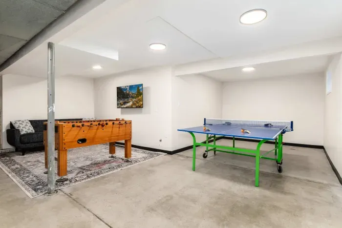 Entertainment space designed for game nights and family bonding.