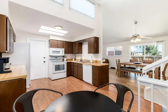 Fully equipped kitchen with modern appliances and plenty of prep space.