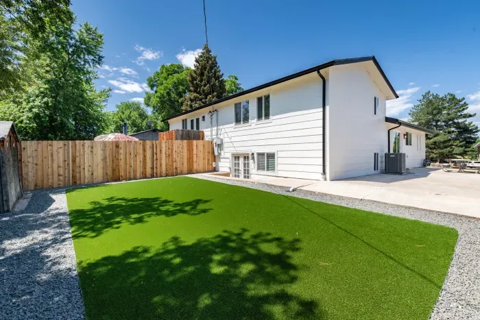 Expansive backyard with green turf and open space to unwind.