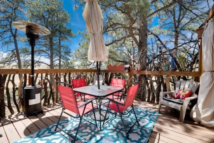 Dining area...Giant umbrella covers the entire dining space.