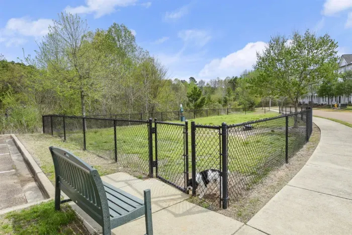 The dog park is around the corner for you pups to play.