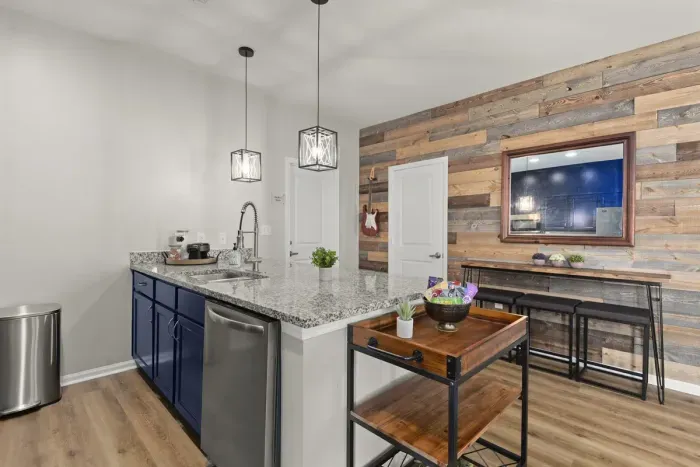 Open concept kitchen, additional high top seating and storage make this an outstanding gathering place.