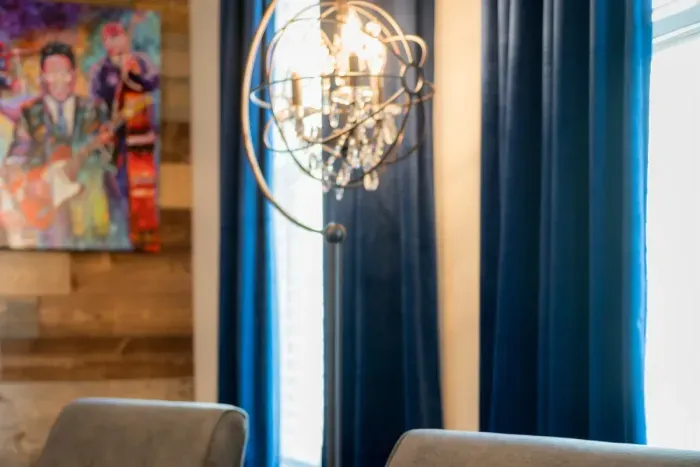 Designer lighting touches & warm finishes make this a one-of-a-kind experience.