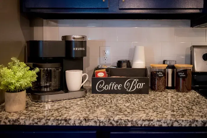 Wake up to your customized coffee bar with K pods, ground coffee and whole bean coffee with grinder and sweeteners with creamer. Relax in your home, front porch or on the go!