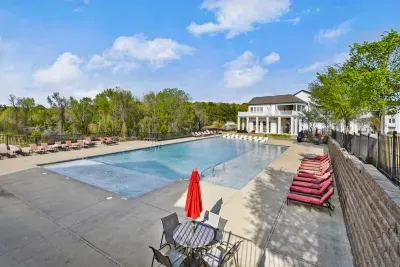 The clubhouse pool is a large, fun space to cool off and meet new people when it warms up!