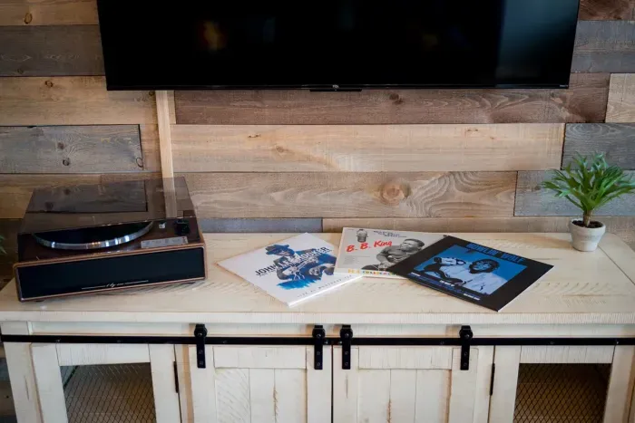 Listen to vinyl track from the small Mississippi blues music library in the rocking chair and relax your cares away.