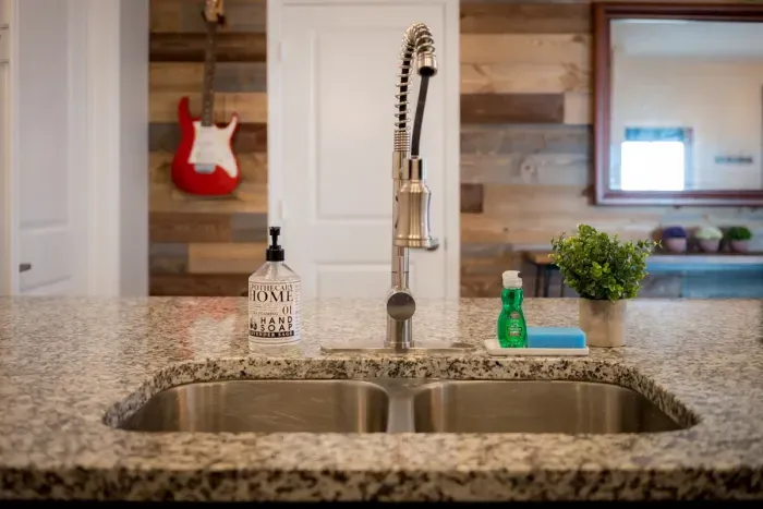 All the comforts of home. And an electric guitar on the wall.