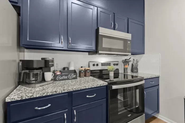 Wake up to a fully stocked coffee bar-pods, ground coffee, whole bean, grinder, sweeteners and creamer.